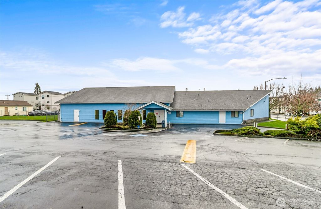 Photo of 7550 Martin Luther King Jr Way S, Seattle, WA 98118 (MLS # 2467910)