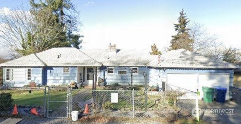 Photo of 1050 S 100th Street, Seattle, WA 98168 (MLS # 2075037)