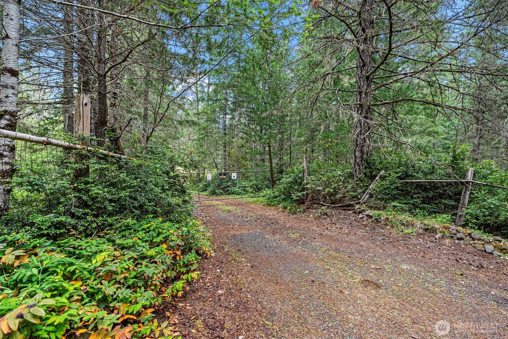 Photo of 80 NE Smithy Forge Lane, Belfair, WA 98528 (MLS # 2545760)