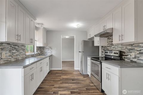 Photo of 1102 Tule Lake Rd S Rd, Tacoma, WA 98444 (MLS # 2398726)