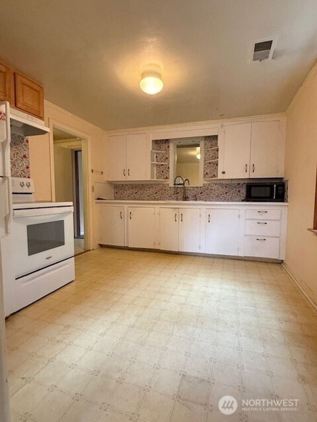 Photo of 12018 Sand Point Way NE, Seattle, WA 98125 (MLS # 2453720)