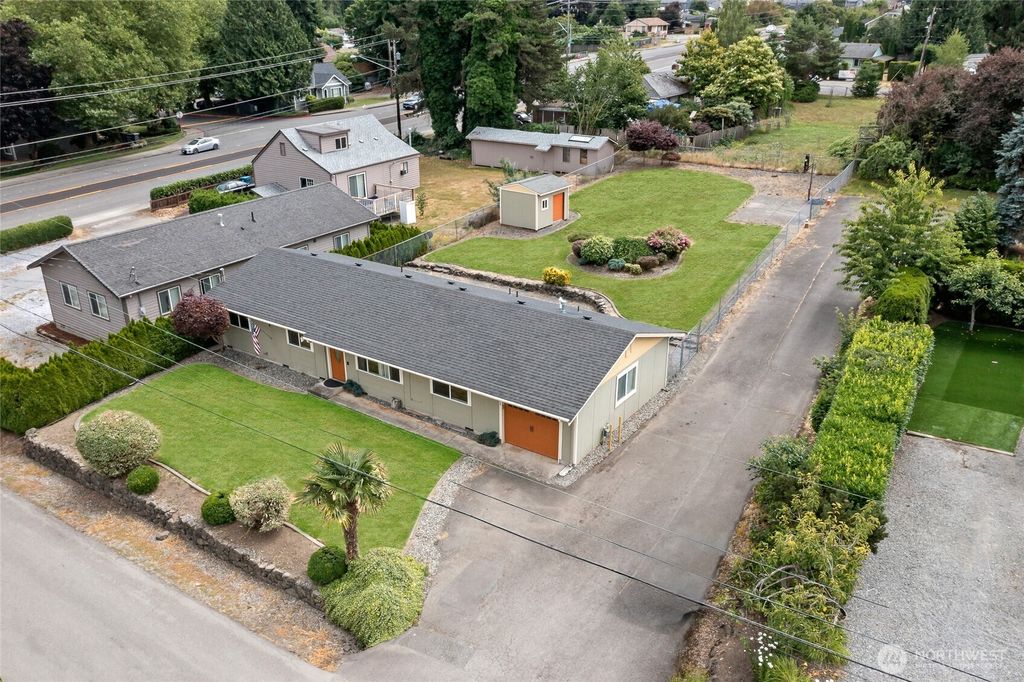 Photo of 10717 SE 211th Street, Kent, WA 98031 (MLS # 2556913)