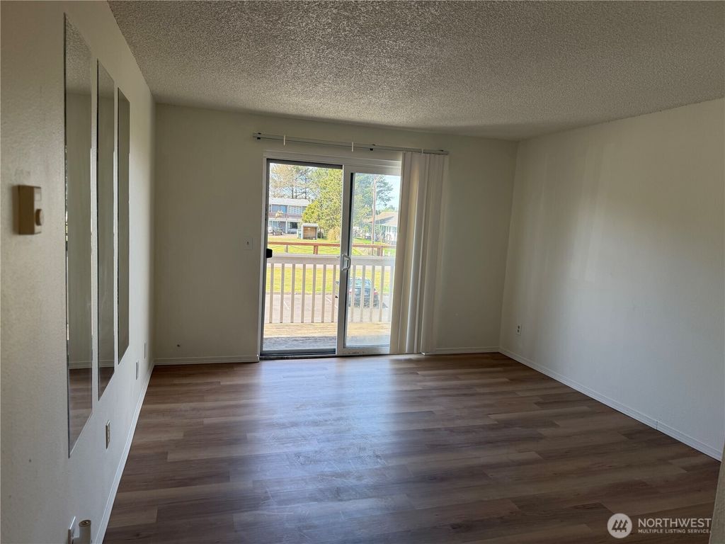 Photo of 766 NW Ocean Court #211, Ocean Shores, WA 98569 (MLS # 2510568)