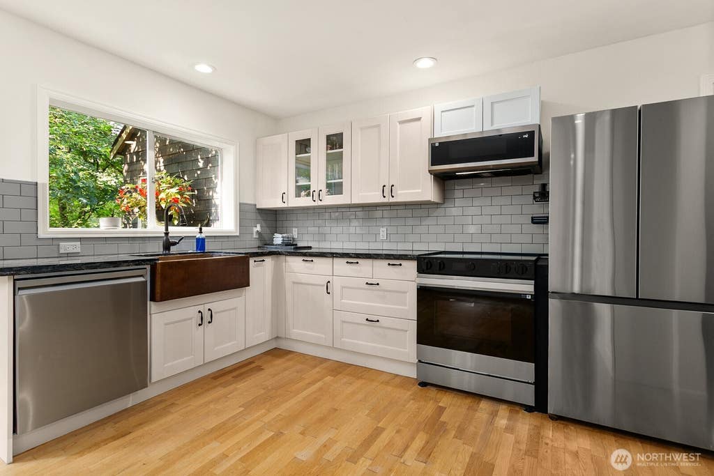 Photo of 3406 W Government Way #3, Seattle, WA 98199 (MLS # 2567629)