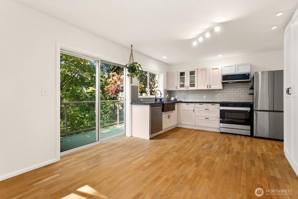 Photo of 3406 W Government Way #3, Seattle, WA 98199 (MLS # 2567629)