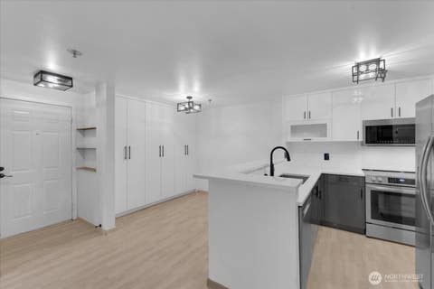 Photo of 975 Abeerdeen Avenue NE #D105, Renton, WA 98056 (MLS # 2540615)