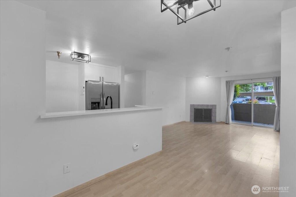 Photo of 975 Abeerdeen Avenue NE #D105, Renton, WA 98056 (MLS # 2540615)
