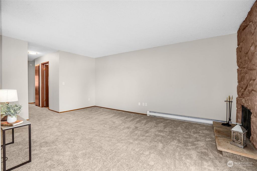 Photo of 12423 NE 131st Court #E-201, Kirkland, WA 98034 (MLS # 2128988)