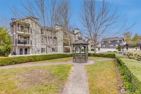 Photo of 10619 SE 261st Place #E304, Kent, WA 98030 (MLS # 2509050)