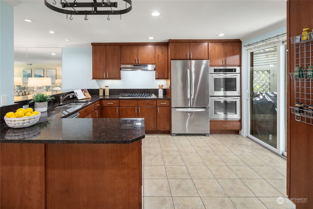Photo of 6121 NE 175th Street #C102, Kenmore, WA 98028 (MLS # 2297597)