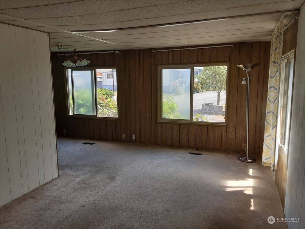 Photo of 12200 Stone Avenue N #10, Seattle, WA 98133 (MLS # 2059452)