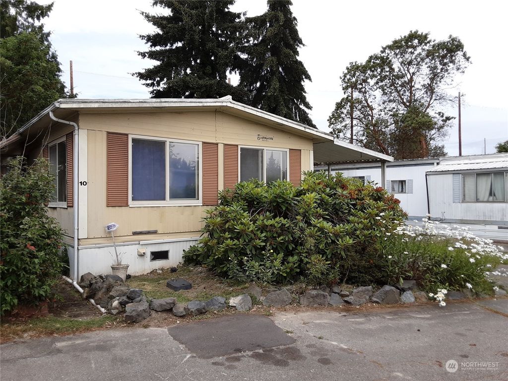 Photo of 12200 Stone Avenue N #10, Seattle, WA 98133 (MLS # 2059452)