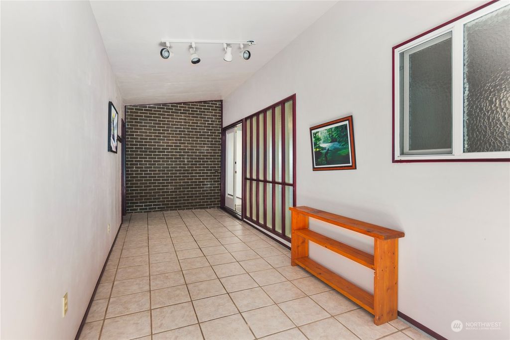 Photo of 12409 83rd Avenue S, Seattle, WA 98178 (MLS # 2285186)