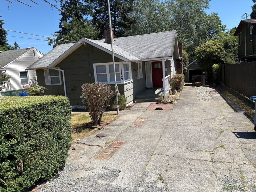 Photo of 11726 20th Avenue NE, Seattle, WA 98125 (MLS # 2390047)