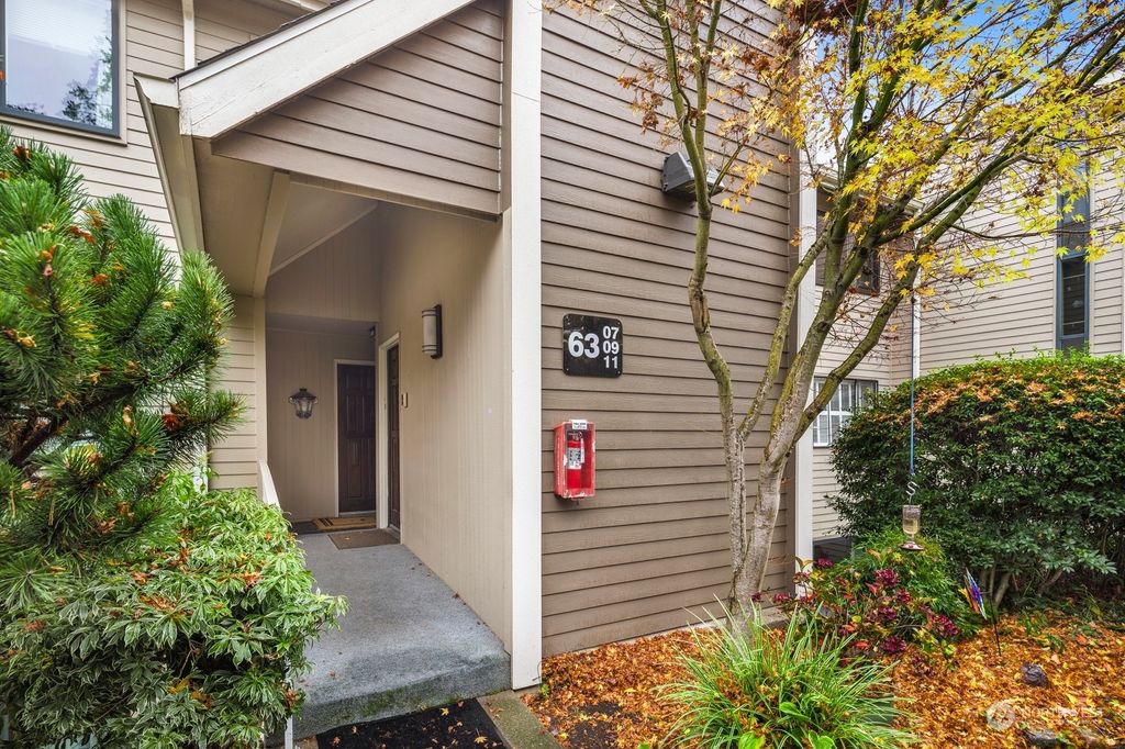 Photo of 6309 Sand Point Way NE #E5, Seattle, WA 98115 (MLS # 2310206)