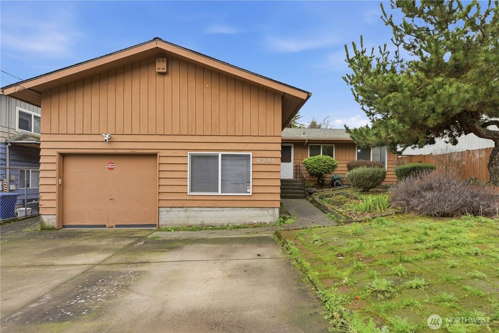 Photo of 6201 47th Avenue S, Seattle, WA 98118 (MLS # 2476091)