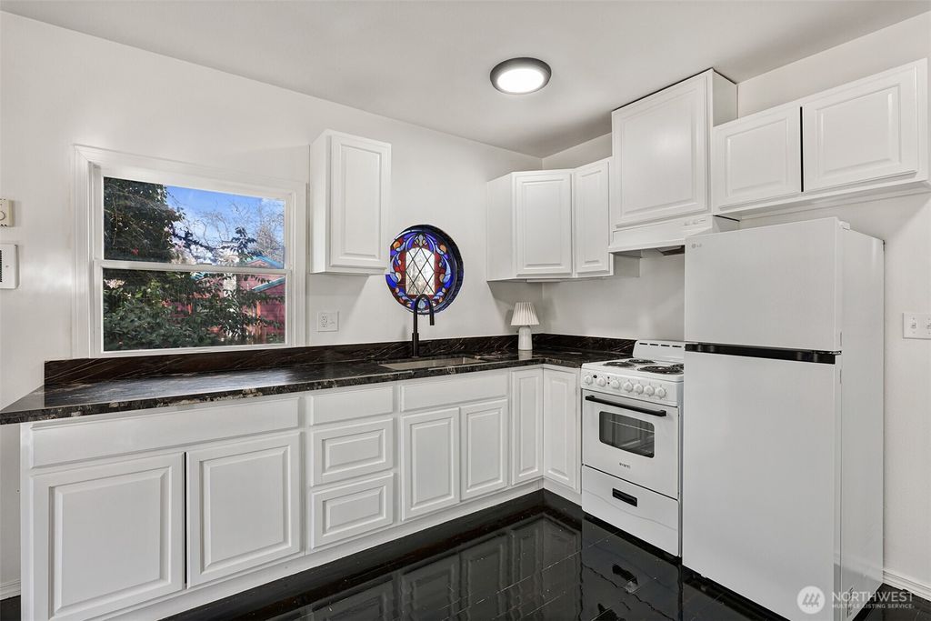 Photo of 5302 S 137th Street, Tukwila, WA 98168 (MLS # 2490868)