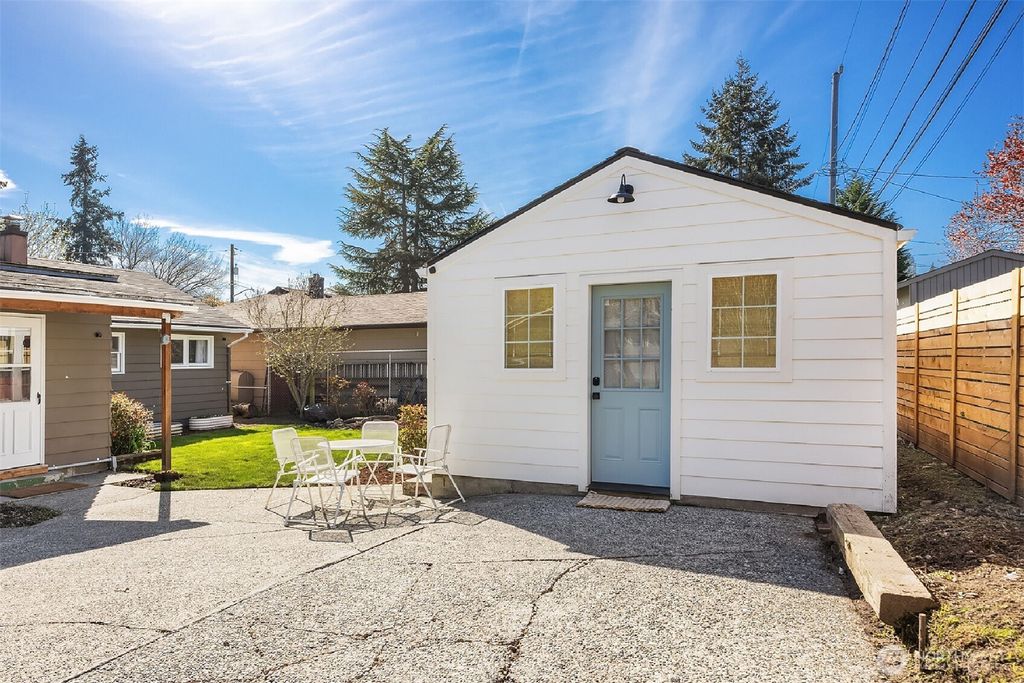 Photo of 9303 30th Avenue SW, Seattle, WA 98126 (MLS # 2357473)