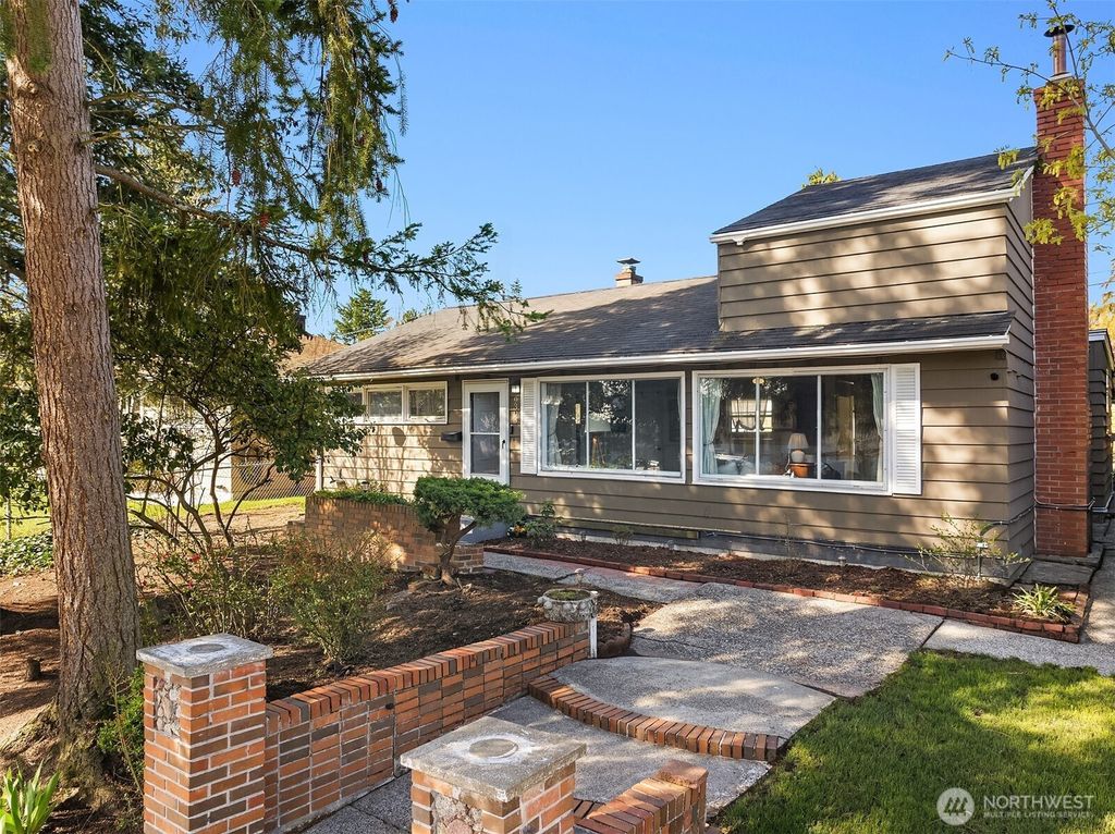 Photo of 9303 30th Avenue SW, Seattle, WA 98126 (MLS # 2357473)