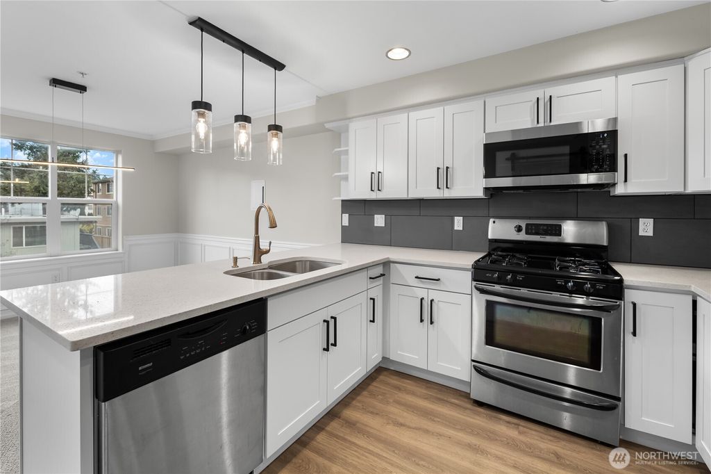 Photo of 10549 Stone Avenue N #202, Seattle, WA 98133 (MLS # 2421136)