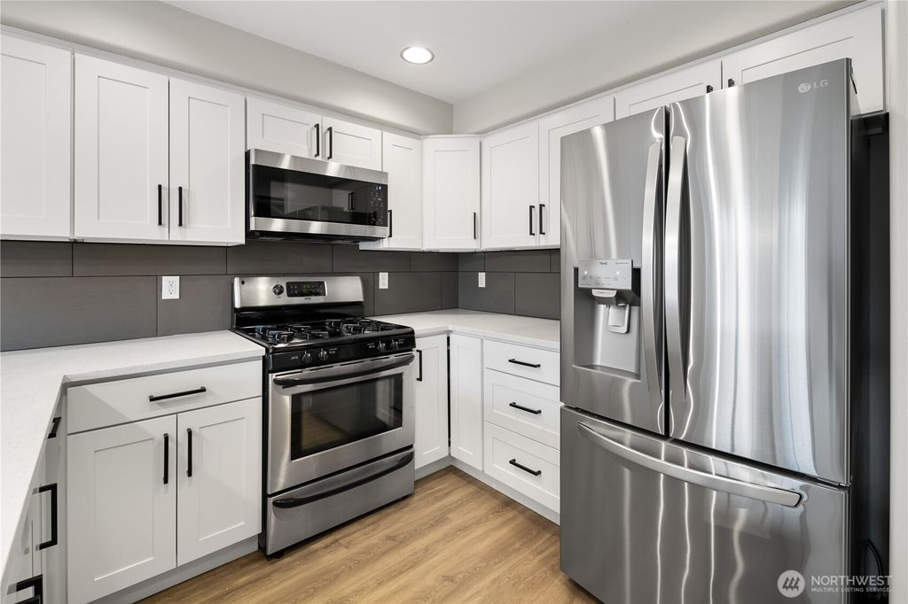 Photo of 10549 Stone Avenue N #202, Seattle, WA 98133 (MLS # 2421136)