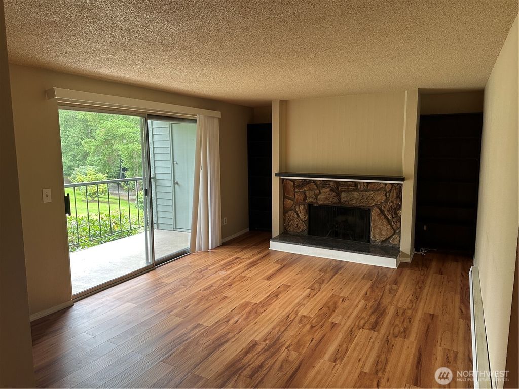 Photo of 4641 W Lake Sammamish Pkwy Pkwy SE #F204, Issaquah, WA 98027 (MLS # 2430552)
