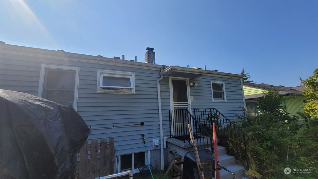 Photo of 8916 31st Ave, Seattle, WA 98117 (MLS # 2180145)