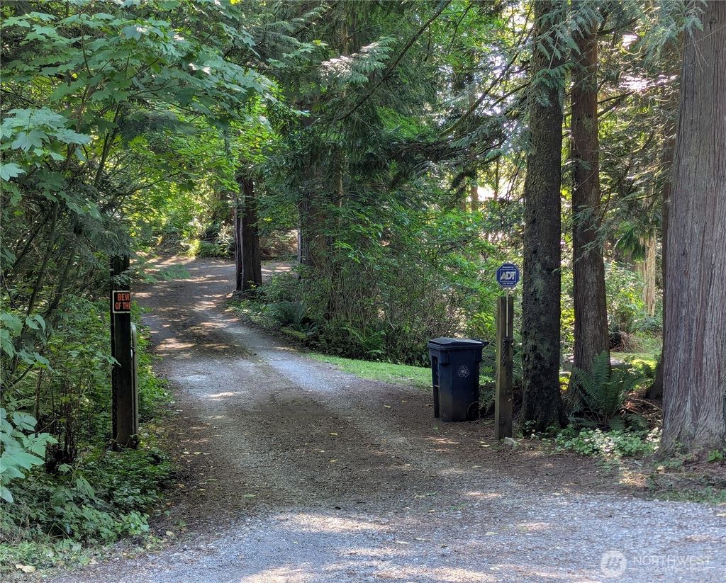 Photo of 20011 Tveit Road, Arlington, WA 98223 (MLS # 2413208)