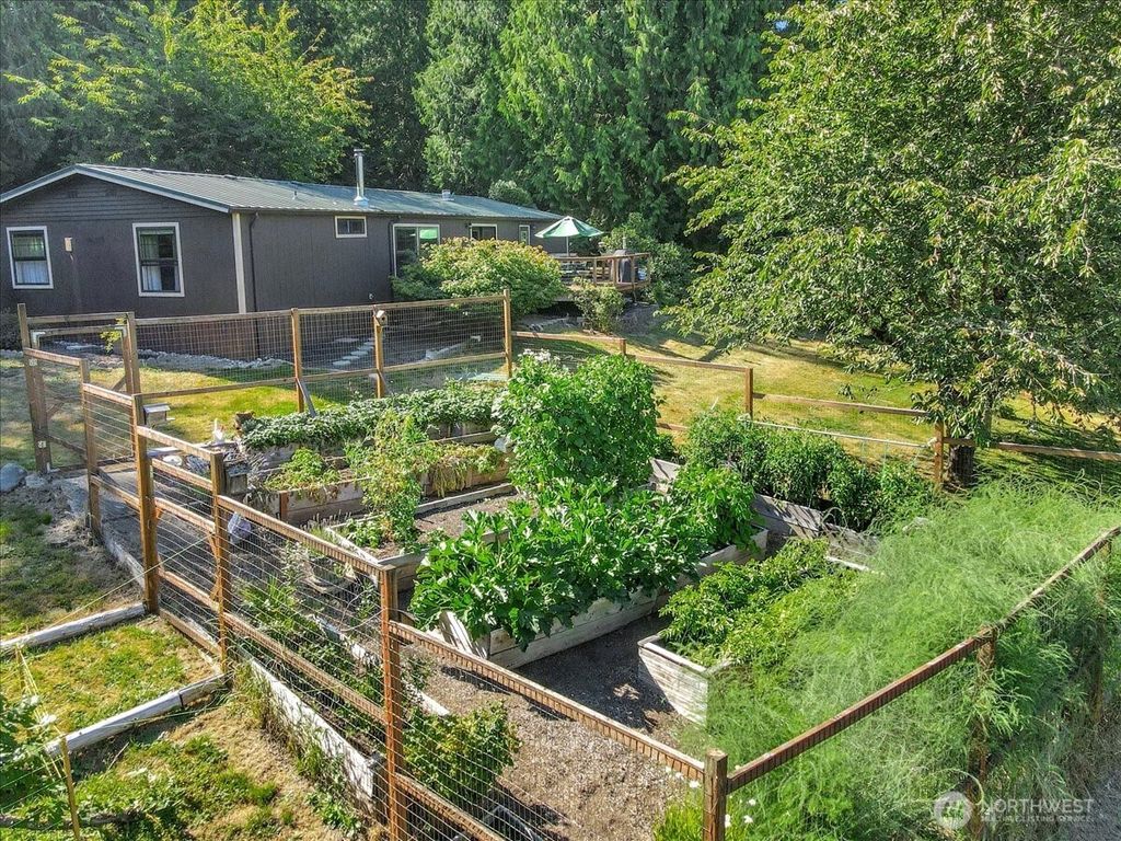 Photo of 20011 Tveit Road, Arlington, WA 98223 (MLS # 2413208)