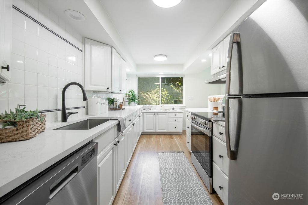 Photo of 911 N 73rd St #104, Seattle, WA 98103 (MLS # 2226242)