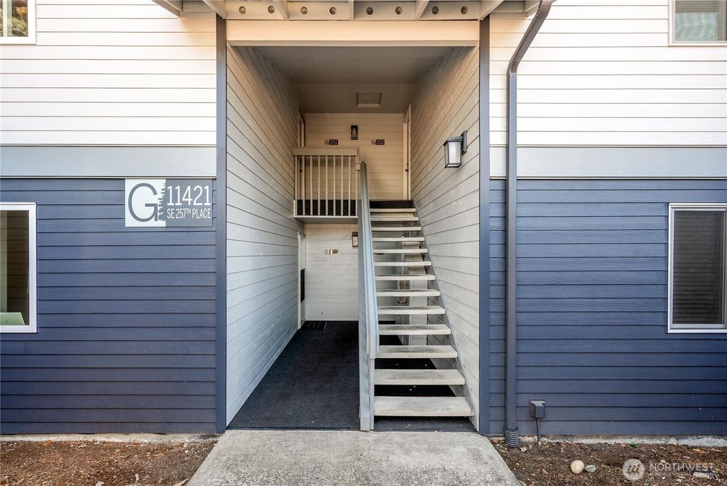 Photo of 11421 SE 257th Place #G-101, Kent, WA 98030 (MLS # 2434160)