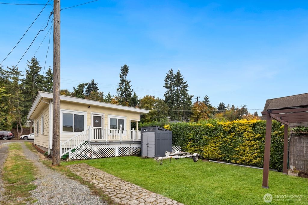 Photo of 10006 Rainier Avenue S, Seattle, WA 98178 (MLS # 2440026)