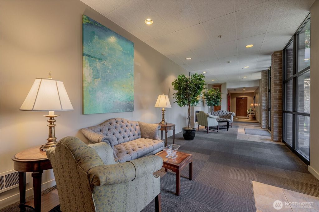 Photo of 9023 Mary Avenue NW #303, Seattle, WA 98117 (MLS # 2332221)