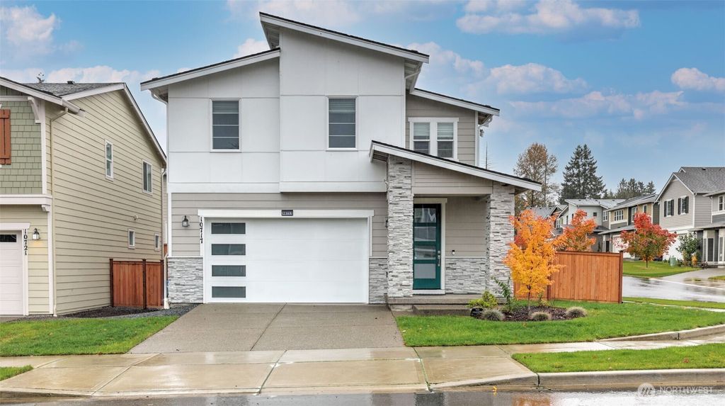 Photo of 10717 SE 243rd Place, Kent, WA 98030 (MLS # 2453052)