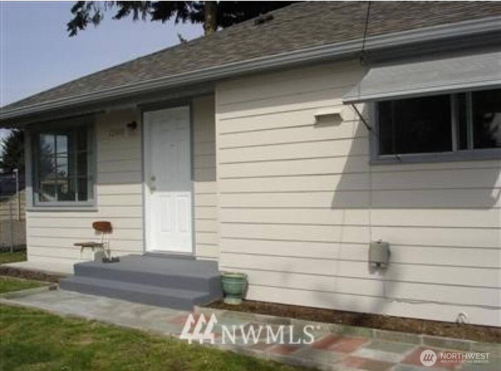 Photo of 12010 76TH Avenue S, Seattle, WA 98178 (MLS # 2469267)