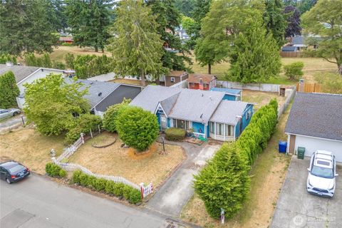 Photo of 15406 12th Avenue E, Tacoma, WA 98445 (MLS # 2402514)