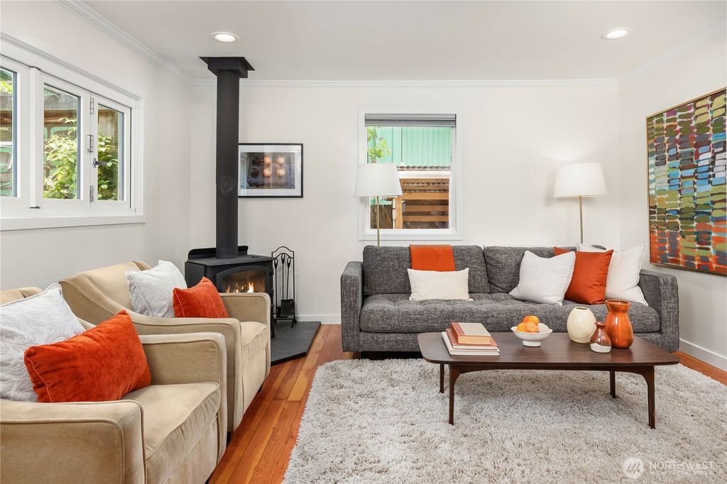 Photo of 1410 N 100th Street, Seattle, WA 98133 (MLS # 2386106)