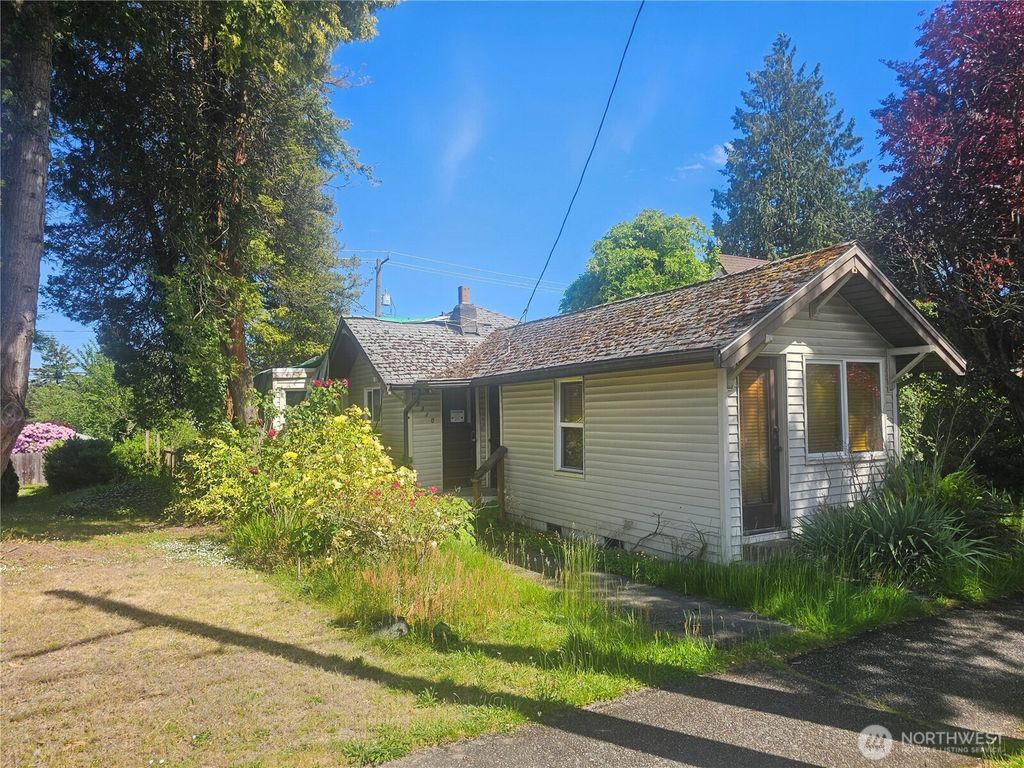 Photo of 7310 35th Avenue SW, Seattle, WA 98126 (MLS # 2385081)