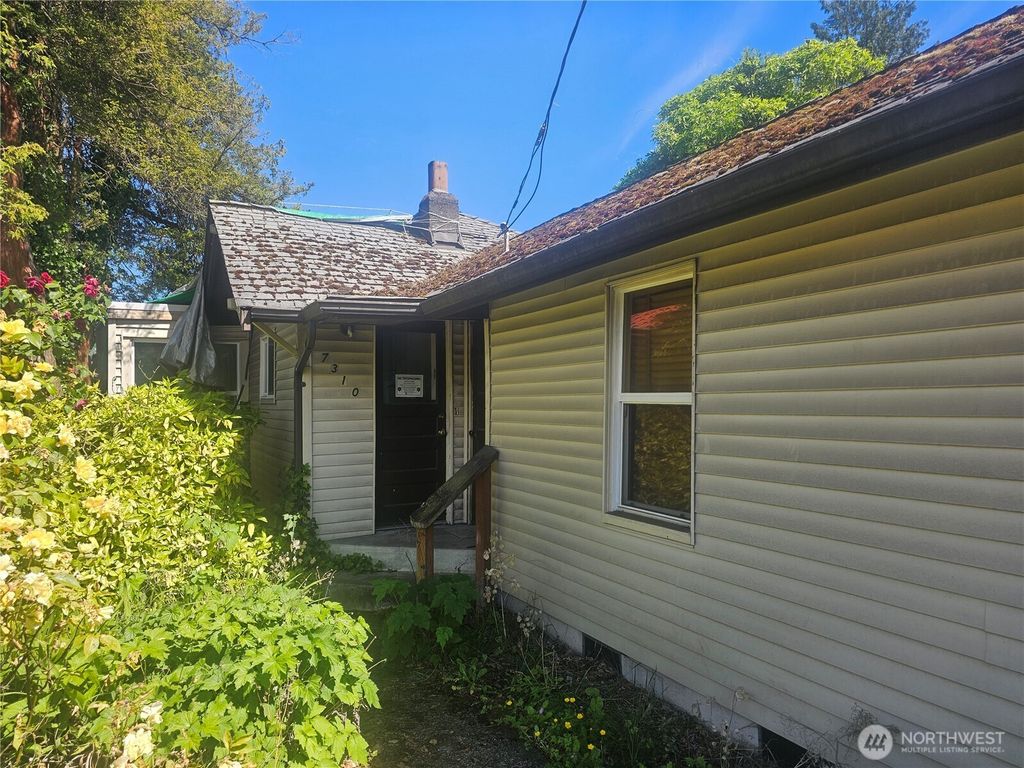 Photo of 7310 35th Avenue SW, Seattle, WA 98126 (MLS # 2385081)