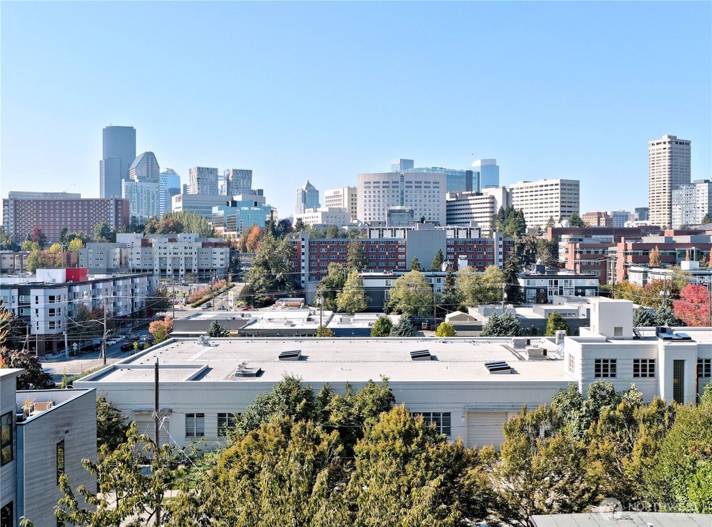 Photo of 717 15th Avenue #D, Seattle, WA 98122 (MLS # 2594143)