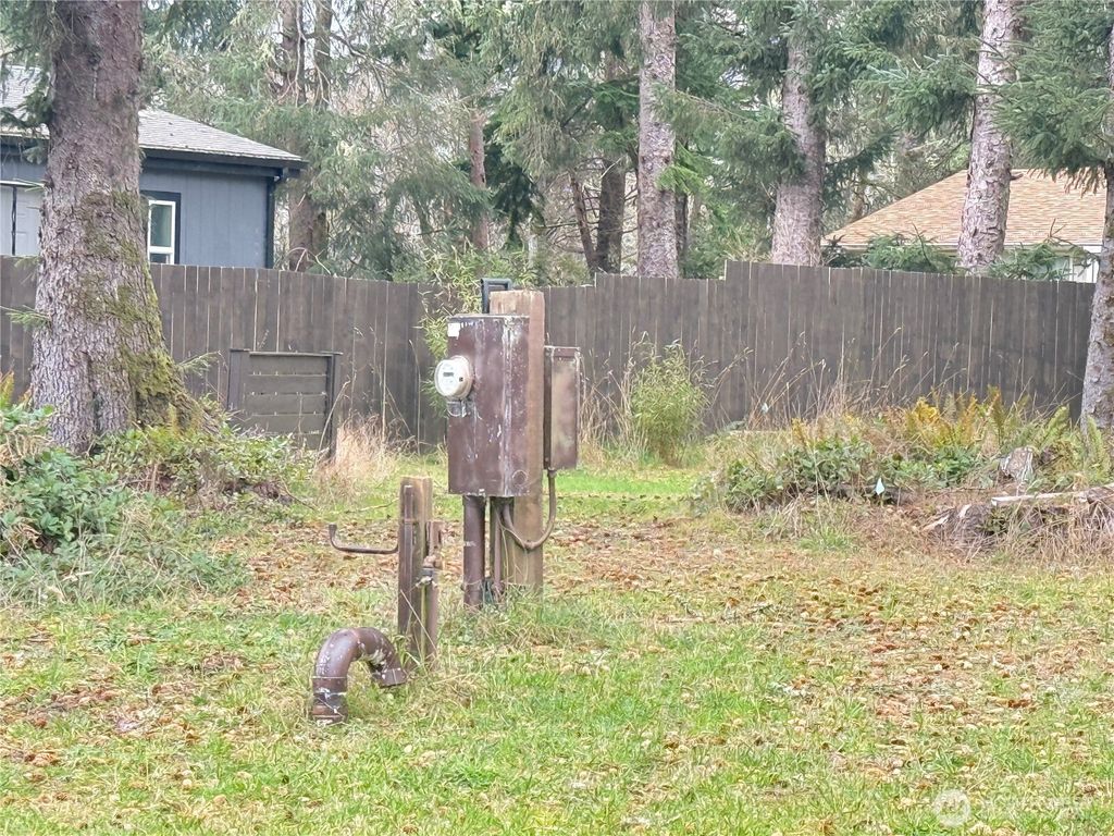 Photo of 743 Duck Lake Drive NE, Ocean Shores, WA 98569 (MLS # 2475566)