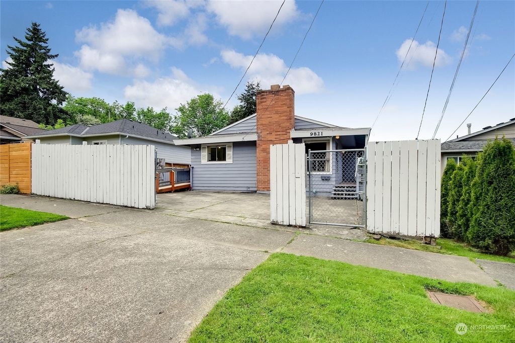 Photo of 9821 57th Avenue S, Seattle, WA 98118 (MLS # 2067321)