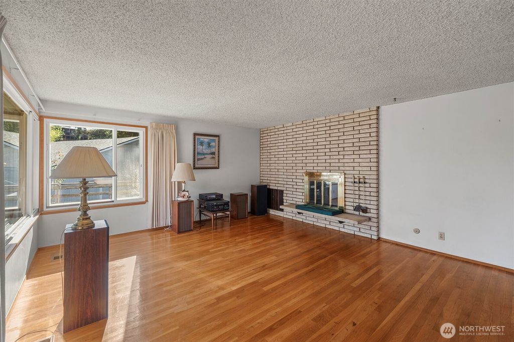 Photo of 1027 S 112th Street, Seattle, WA 98168 (MLS # 2440843)