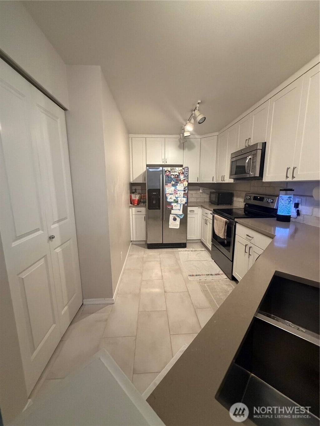 Photo of 1500 S 18th Street #D201, Renton, WA 98055 (MLS # 2517363)