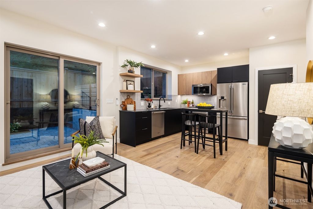 Photo of 9047 Dibble Avenue NW #C, Seattle, WA 98117 (MLS # 2397038)