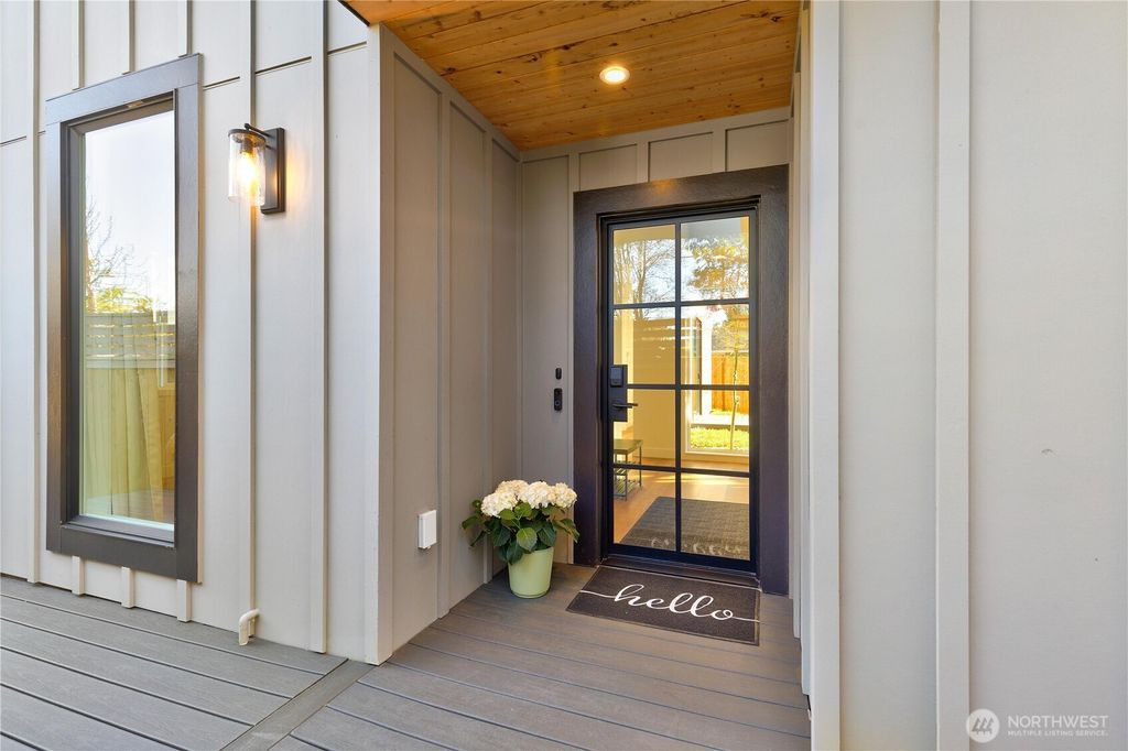 Photo of 10039 13th Avenue NW, Seattle, WA 98177 (MLS # 2505556)