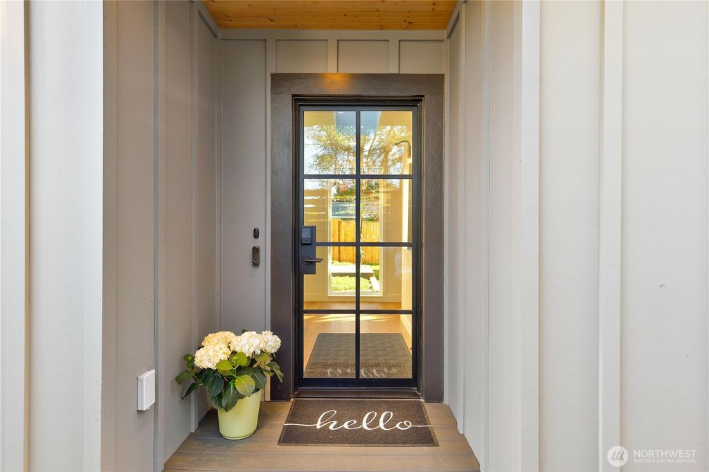 Photo of 10039 13th Avenue NW, Seattle, WA 98177 (MLS # 2505556)