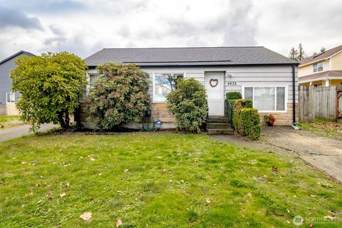 Photo of 4435 S 144th St St, Tukwila, WA 98168 (MLS # 2459353)