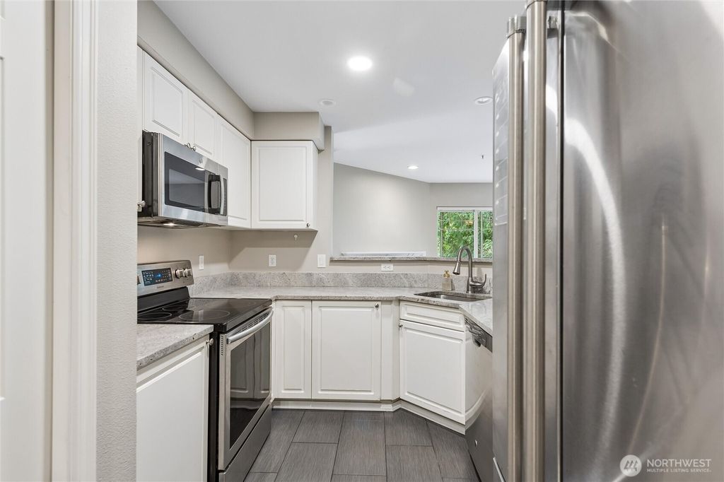 Photo of 18501 SE Newport Way Way #H236, Issaquah, WA 98029 (MLS # 2509389)