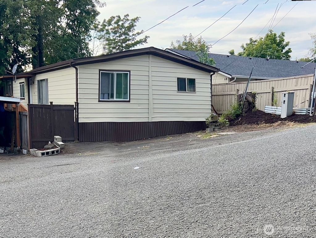 Photo of 13101 64th Avenue S, Seattle, WA 98178 (MLS # 2422651)
